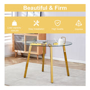 Table and chair set.A Modern Minimalist Style Round Clear Tempered Glass Table with Metal Legs.Paried with white chairs with Modern PU Leather High Back Upholstered and C-Tube Golden Legs.