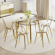 Table and chair set.Modern circular transparent tempered glass table, tempered glass tabletop, golden metal table legs.A Set of  6 Transparent Plastic Chairs with gold legs.