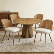 Round wooden dining table + 4 brown wicker dining chairs in Bohemian medieval style with soft beige sponge cushions